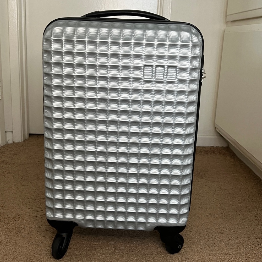 Silver Luggage with Wheels